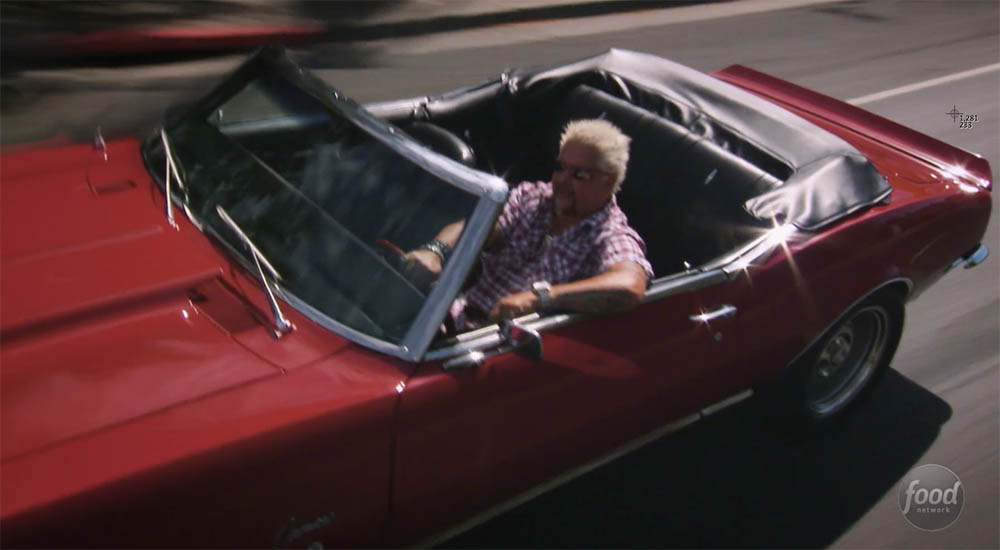 Guy Fieri in his hot rod